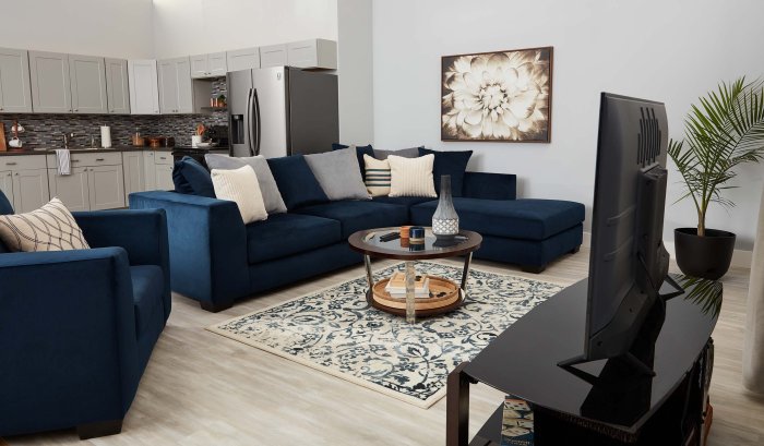 Rug sectional placement rugs oversized homelyrugs layouts